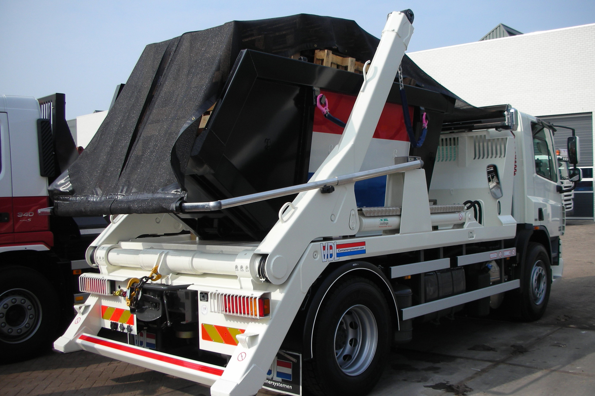 Roll·Rite® DC Series Gantry Sheeting System for Hook Loaders and Skiploaders